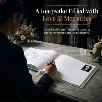 Personalized Funeral guest book open on a table as a person writes a heartfelt message, featuring lined pages for condolences and memories, creating a meaningful keepsake to honor a loved one.
