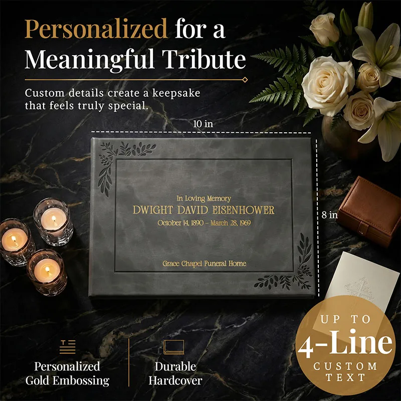 Personalized funeral guestbook with elegant gray hardcover and gold embossing, shown with candles and flowers, featuring custom text up to 4 lines—ideal keepsake for a meaningful tribute.