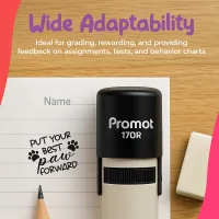 Black and beige Teacher Ink Stamp shown beside its removable cap against a bright pink background. Text on image says “Self-Inking Technology,” “Ready to go in seconds, more time for teaching and rewarding students,” and “Stamp Cover Included.”