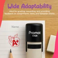 Black self inking teacher stamp placed on lined paper beside a pencil and a red “A+” apple stamp impression on a wooden desk. Text on the image says “Wide Adaptability. Ideal for grading, rewarding, and providing feedback on assignments, tests, and behavi